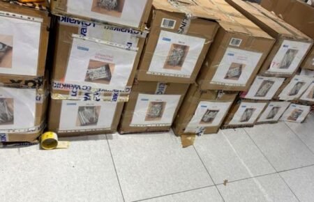 Labeled cartons ready for tracked transport